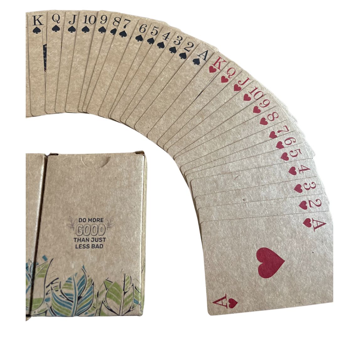 A deck of playing cards with a floral design on the back